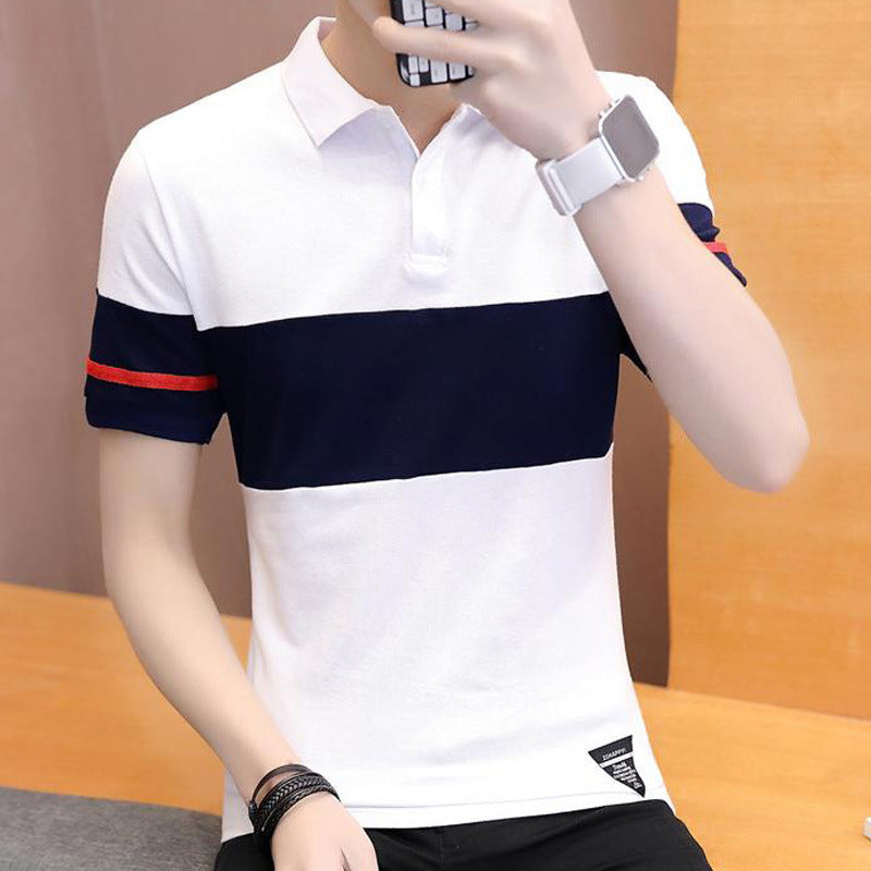 Cotton polo shirt featuring a short sleeve design and stylish color-blocking in navy and white.