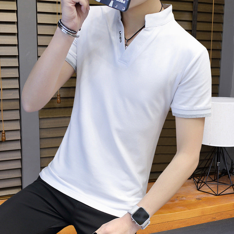 Cotton polo shirt in white color with short sleeves, showcased on a model indoors.
